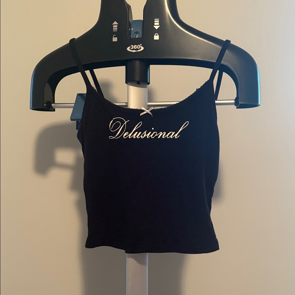Garage - Statement “ delusional “ cropped tank